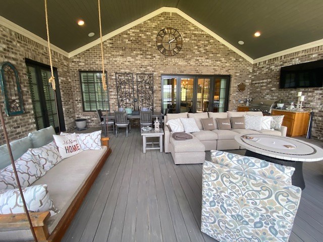 7233 Standing Boy Road Columbus, GA 31904 - Photo 3 of 67 a living room with furniture a flat screen tv and a large window