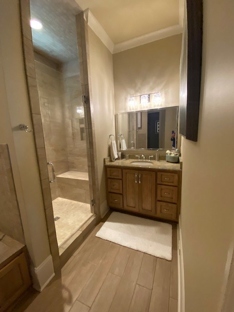7233 Standing Boy Road Columbus, GA 31904 - Photo 34 of 67 a bathroom with a sink a mirror and a shower