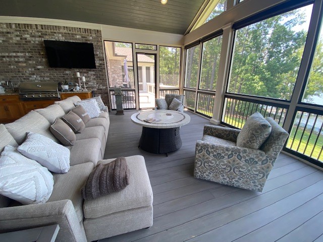 7233 Standing Boy Road Columbus, GA 31904 - Photo 4 of 67 a living room with furniture and a flat screen tv