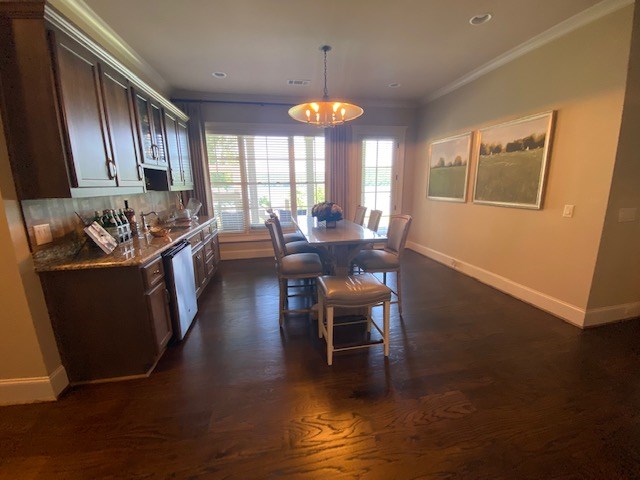 7233 Standing Boy Road Columbus, GA 31904 - Photo 44 of 67 a view of a dining room with furniture window and wooden floor