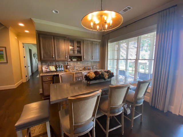 7233 Standing Boy Road Columbus, GA 31904 - Photo 45 of 67 a view of a dining room with furniture window and wooden floor