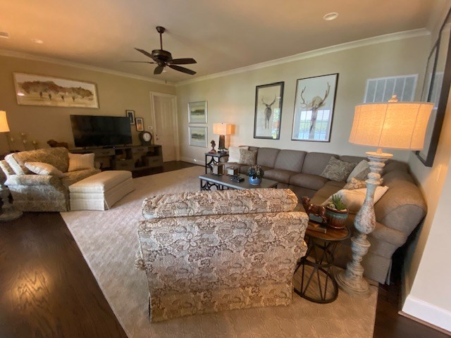 7233 Standing Boy Road Columbus, GA 31904 - Photo 46 of 67 a living room with furniture a flat screen tv and a window