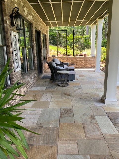 7233 Standing Boy Road Columbus, GA 31904 - Photo 51 of 67 a backyard of a house with garden and outdoor seating