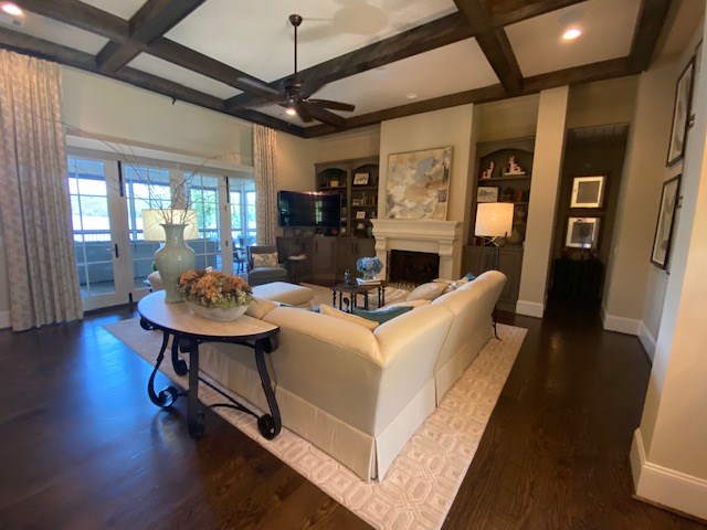 7233 Standing Boy Road Columbus, GA 31904 - Photo 9 of 67 a living room with fireplace furniture and a wooden floor