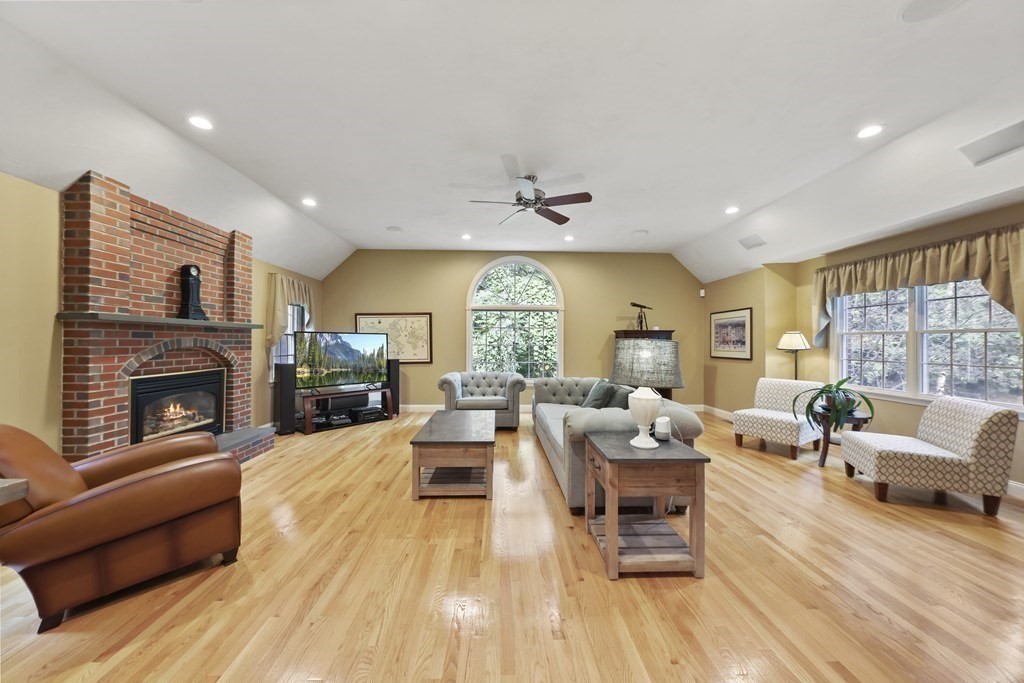 104 Forest Street Middleton, MA 01949 - Photo 13 of 41 a living room with furniture fireplace and window