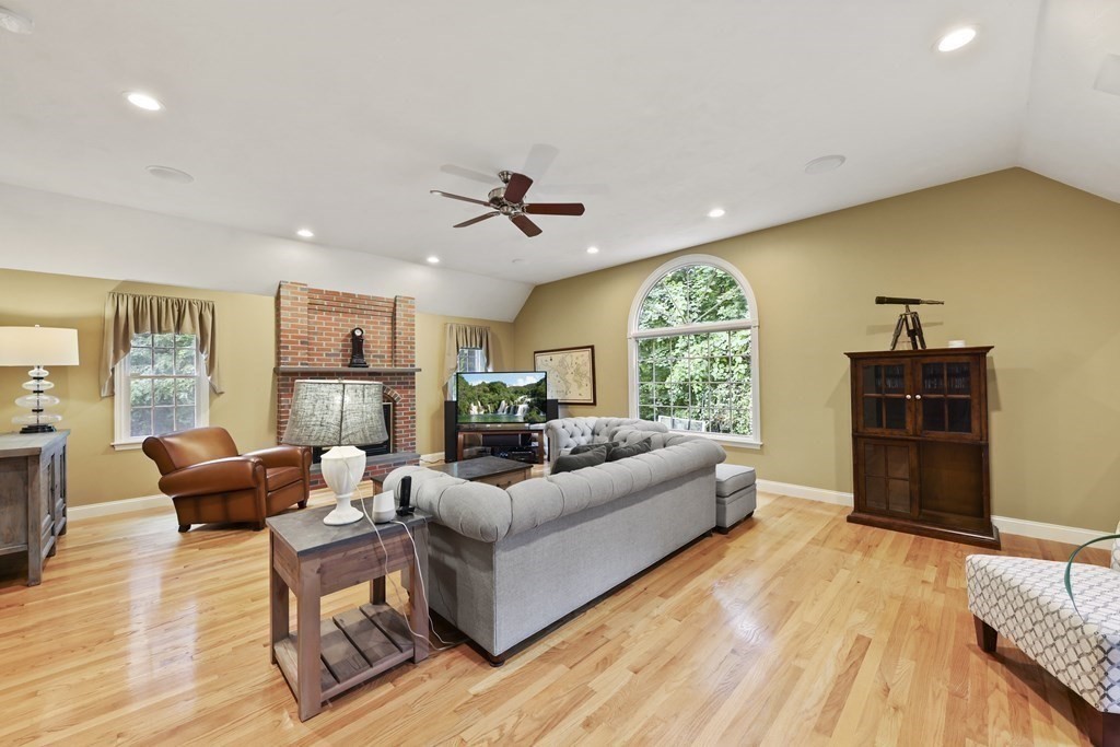104 Forest Street Middleton, MA 01949 - Photo 15 of 41 a living room with furniture and a large window