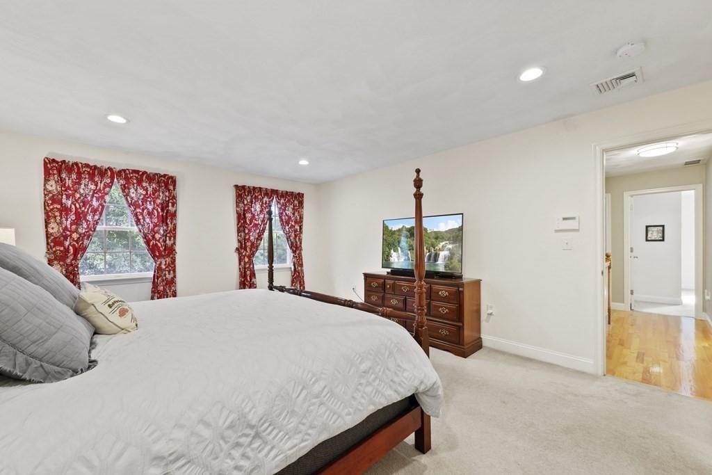 104 Forest Street Middleton, MA 01949 - Photo 20 of 41 a bedroom with a bed and dresser