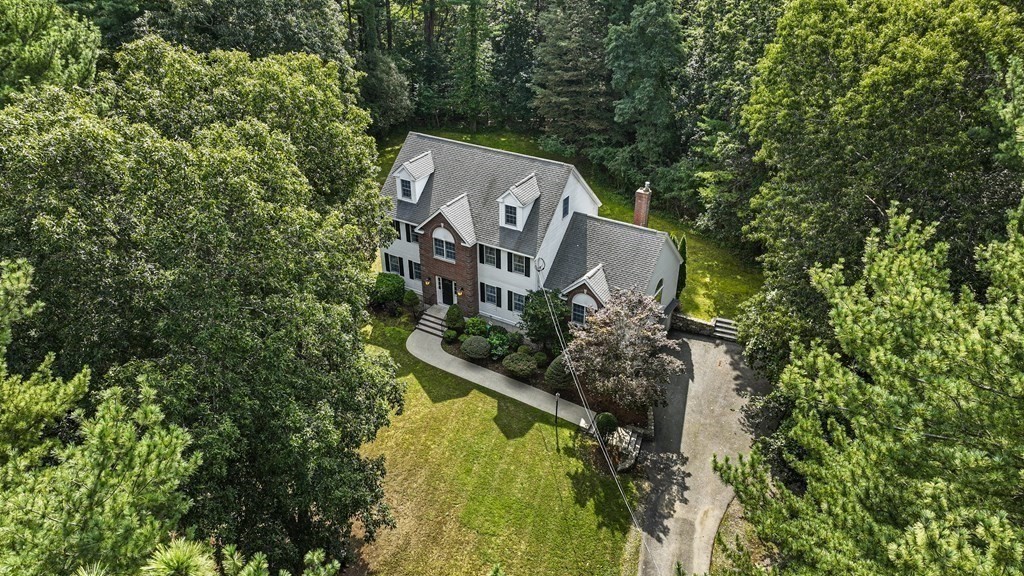 104 Forest Street Middleton, MA 01949 - Photo 2 of 41 an aerial view of a house with a yard