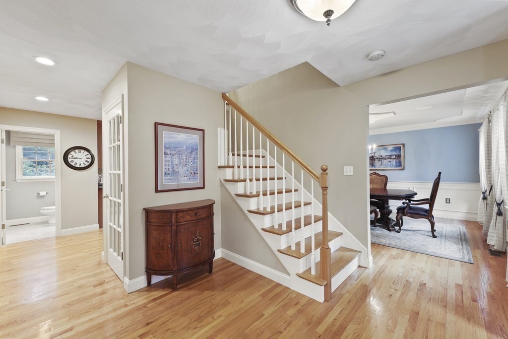 104 Forest Street Middleton, MA 01949 - Photo 3 of 41 a living room with furniture and a wooden floor