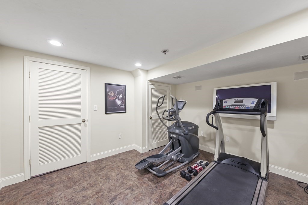 104 Forest Street Middleton, MA 01949 - Photo 32 of 41 a view of a room with gym equipment