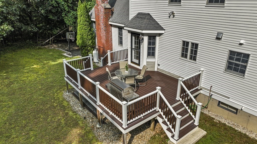 104 Forest Street Middleton, MA 01949 - Photo 36 of 41 a view of a patio with chairs and a table