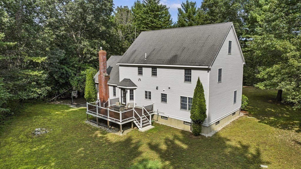 104 Forest Street Middleton, MA 01949 - Photo 39 of 41 aerial view of a house with backyard and trees