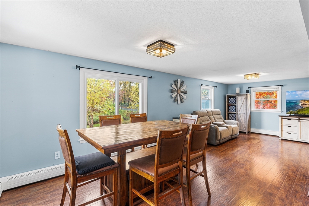 73 North Common Road Westminster, MA 01473 - Photo 11 of 41 a view of a dining room with furniture window and wooden floor