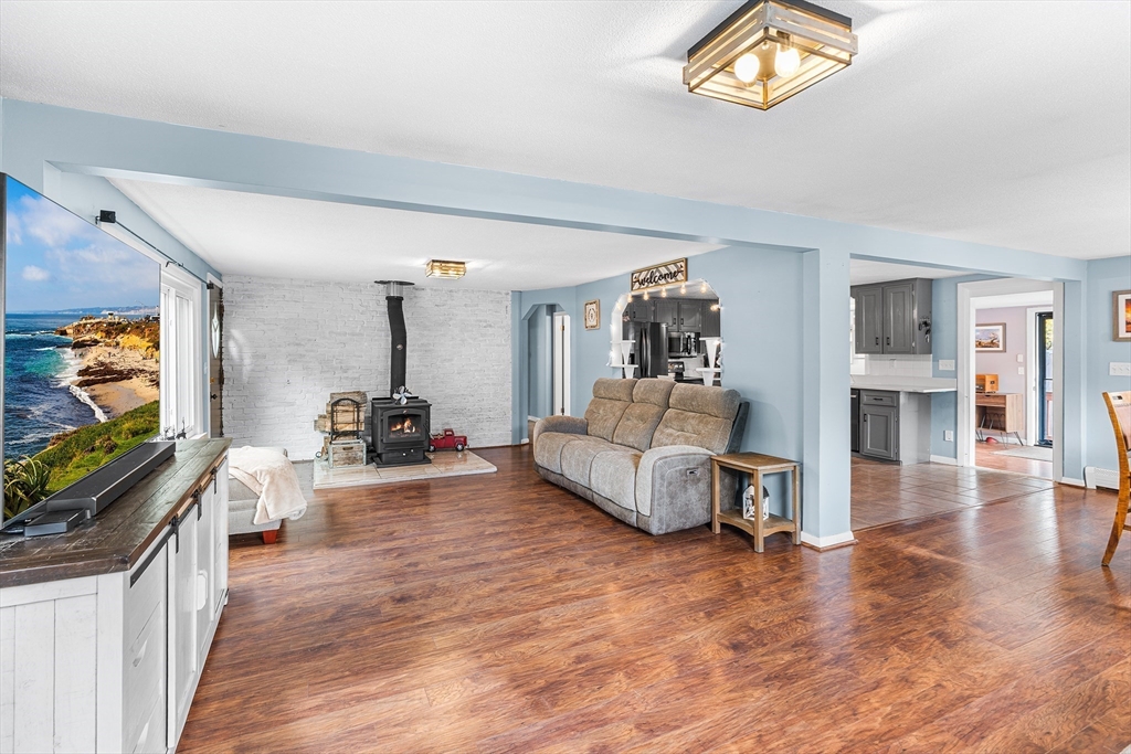 73 North Common Road Westminster, MA 01473 - Photo 12 of 41 a living room with furniture and a flat screen tv