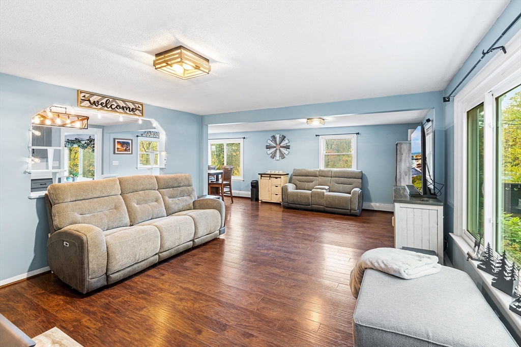 73 North Common Road Westminster, MA 01473 - Photo 13 of 41 a living room with furniture and a large window