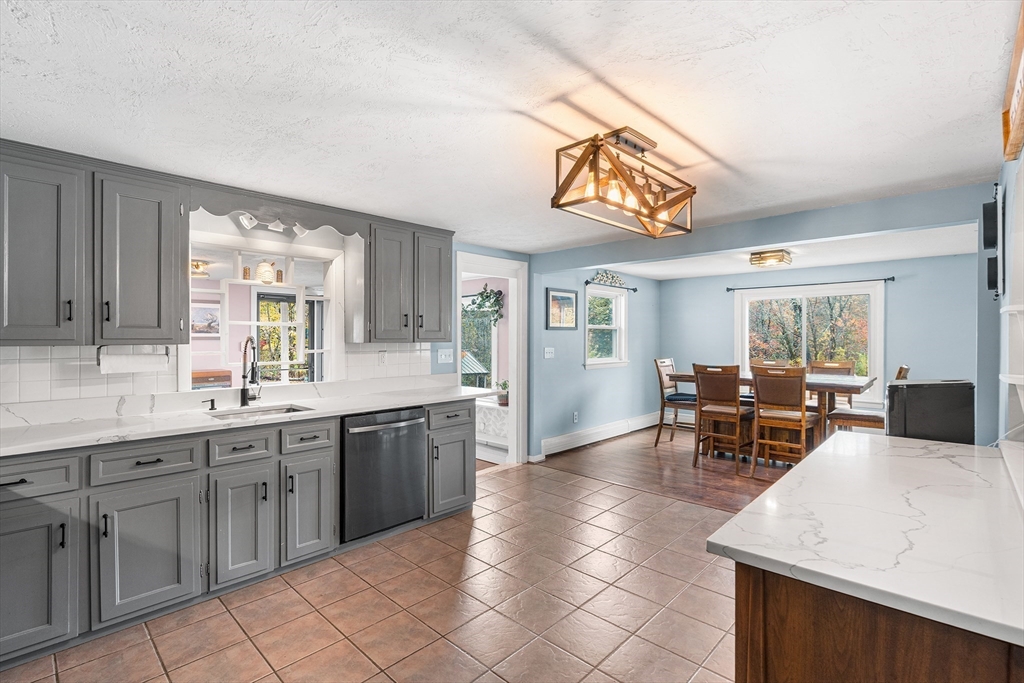 73 North Common Road Westminster, MA 01473 - Photo 2 of 41 a view of a kitchen area with furniture and window