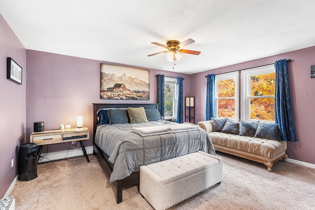 73 North Common Road Westminster, MA 01473 - Photo 21 of 41 a bedroom with a bed and a couch