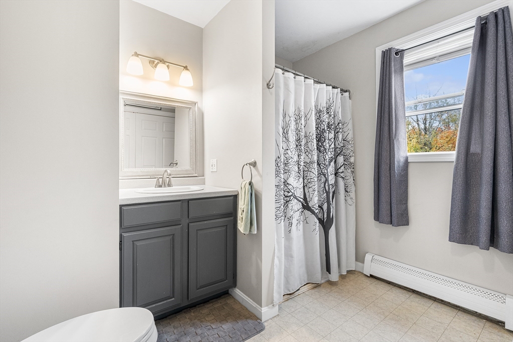 73 North Common Road Westminster, MA 01473 - Photo 24 of 41 a bathroom with a sink toilet and shower