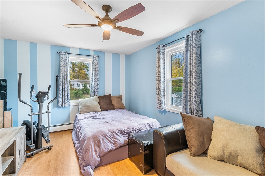 73 North Common Road Westminster, MA 01473 - Photo 26 of 41 a bedroom with a bed couch and a window