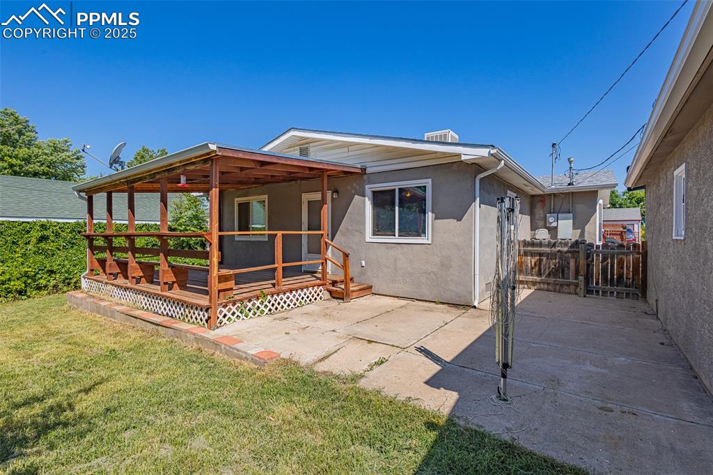 1732 Comanche Road Pueblo, CO 81001 - Photo 14 of 24 a view of a house with a yard porch and furniture