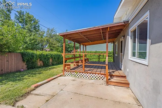 a view of a backyard with a garden