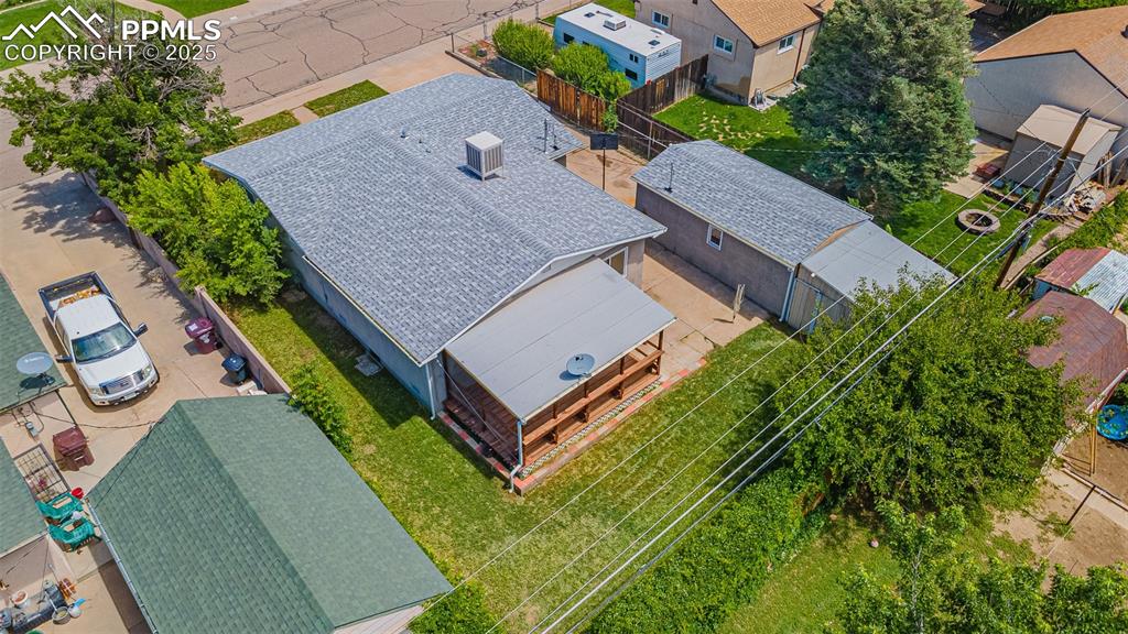 1732 Comanche Road Pueblo, CO 81001 - Photo 20 of 24 an aerial view of a house with a garden