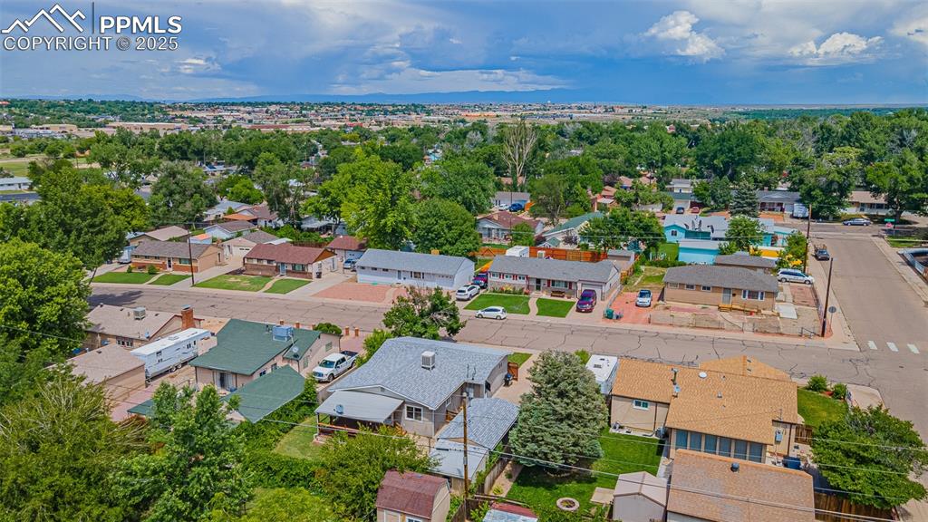 1732 Comanche Road Pueblo, CO 81001 - Photo 22 of 24 an aerial view of a house with a yard
