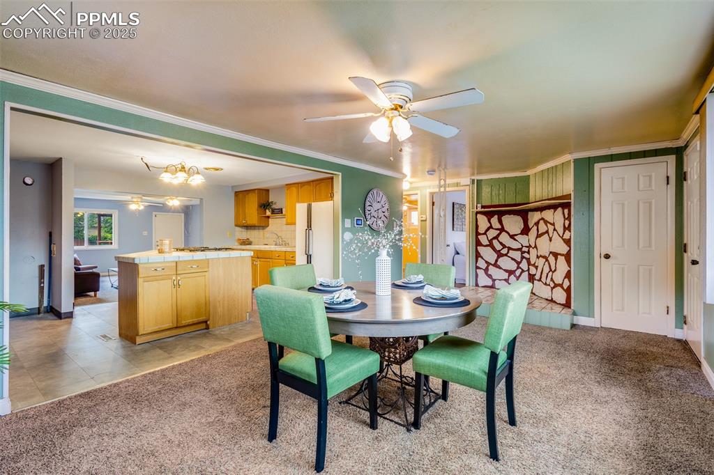1732 Comanche Road Pueblo, CO 81001 - Photo 3 of 24 a dining room with furniture and window