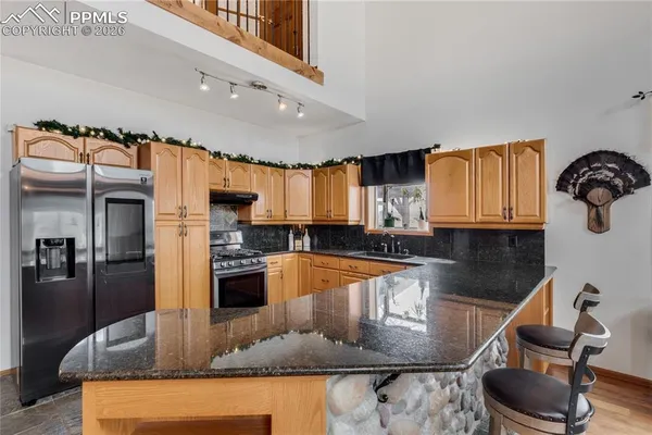 $575,000 | 6980 Weeping Willow Drive, Colorado Springs, CO 80925