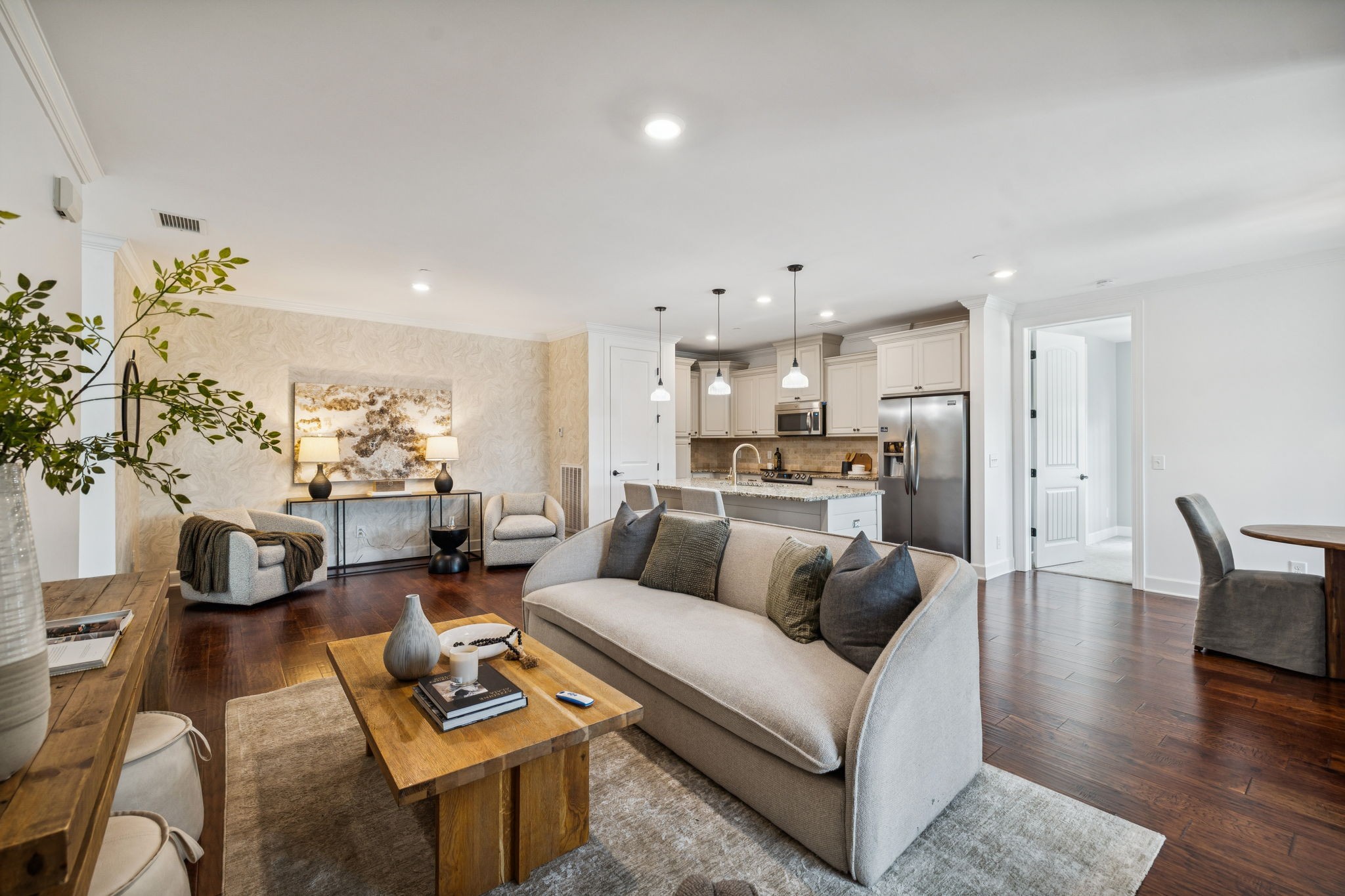 6000 Keats Street, Unit 202 Franklin, TN 37064 - Photo 11 of 47 a living room with furniture kitchen view and a potted plant