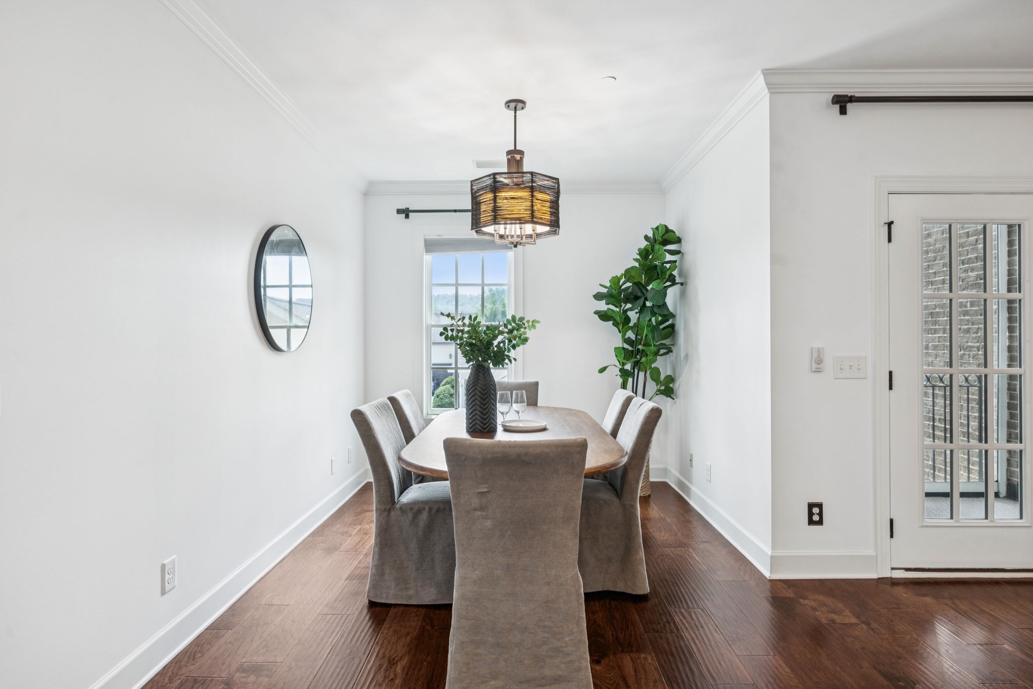 6000 Keats Street, Unit 202 Franklin, TN 37064 - Photo 27 of 47 a view of a dining room with furniture window and wooden floor
