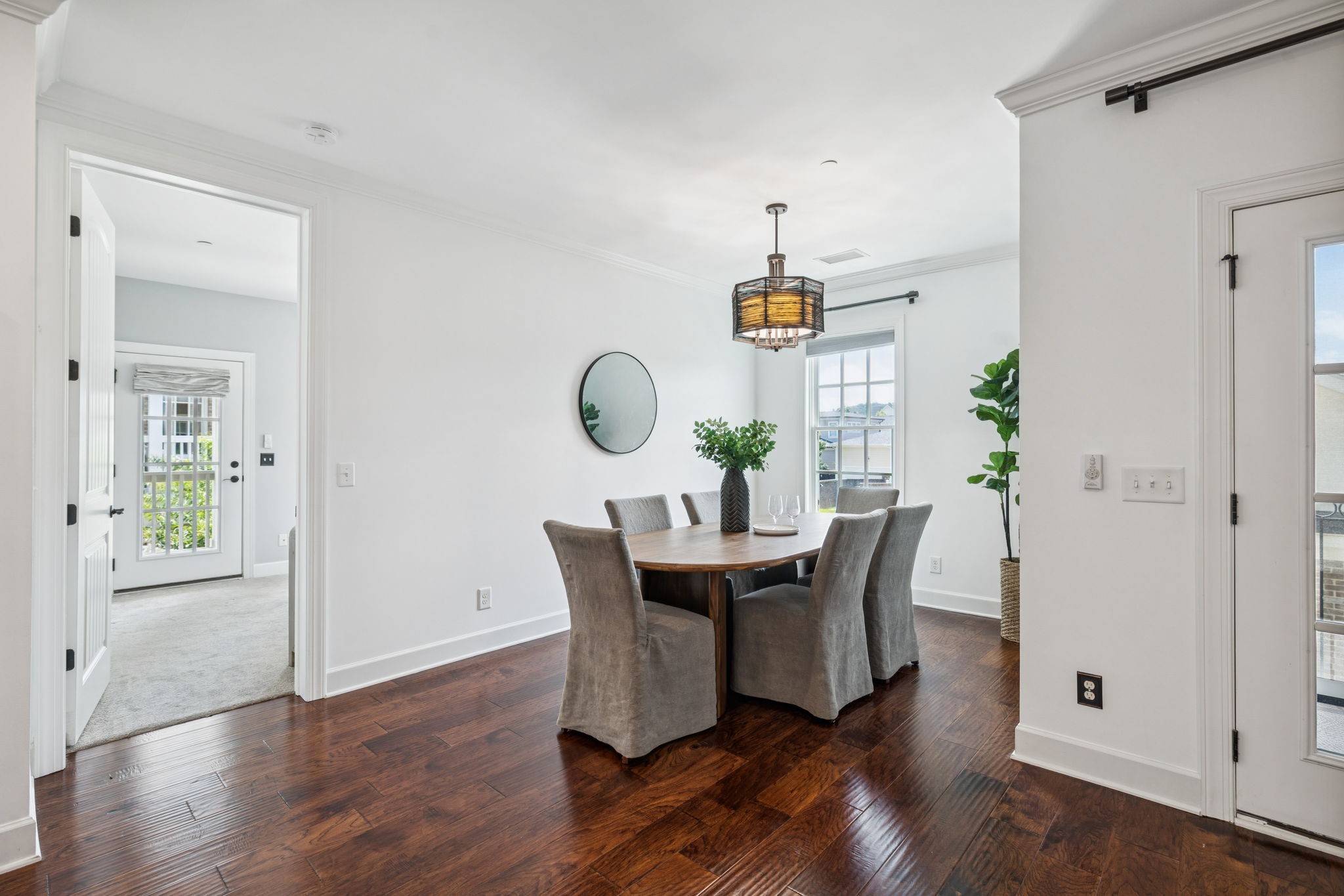 6000 Keats Street, Unit 202 Franklin, TN 37064 - Photo 28 of 47 a view of a dining room with furniture and wooden floor