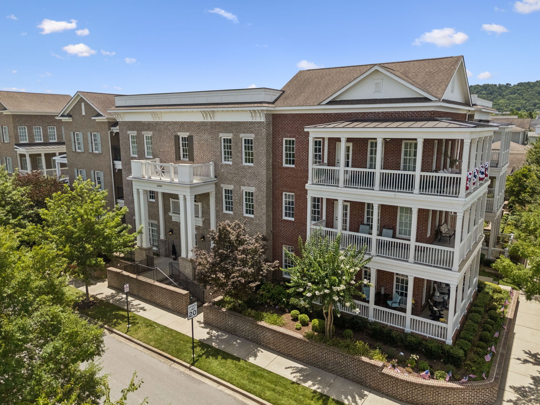 6000 Keats Street, Unit 202 Franklin, TN 37064 - Photo 3 of 47 a front view of a residential apartment building with a yard