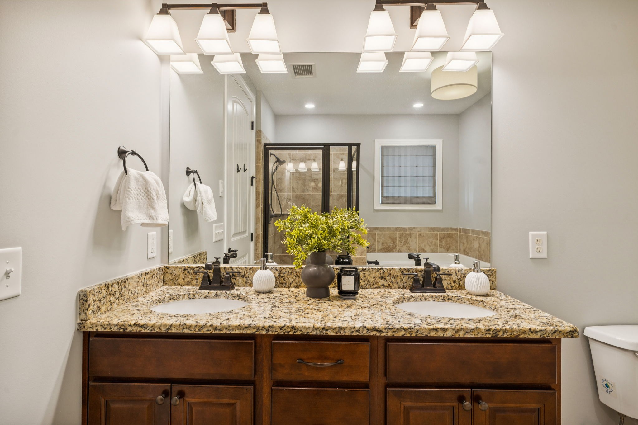 6000 Keats Street, Unit 202 Franklin, TN 37064 - Photo 35 of 47 a bathroom with a granite countertop sink and a mirror