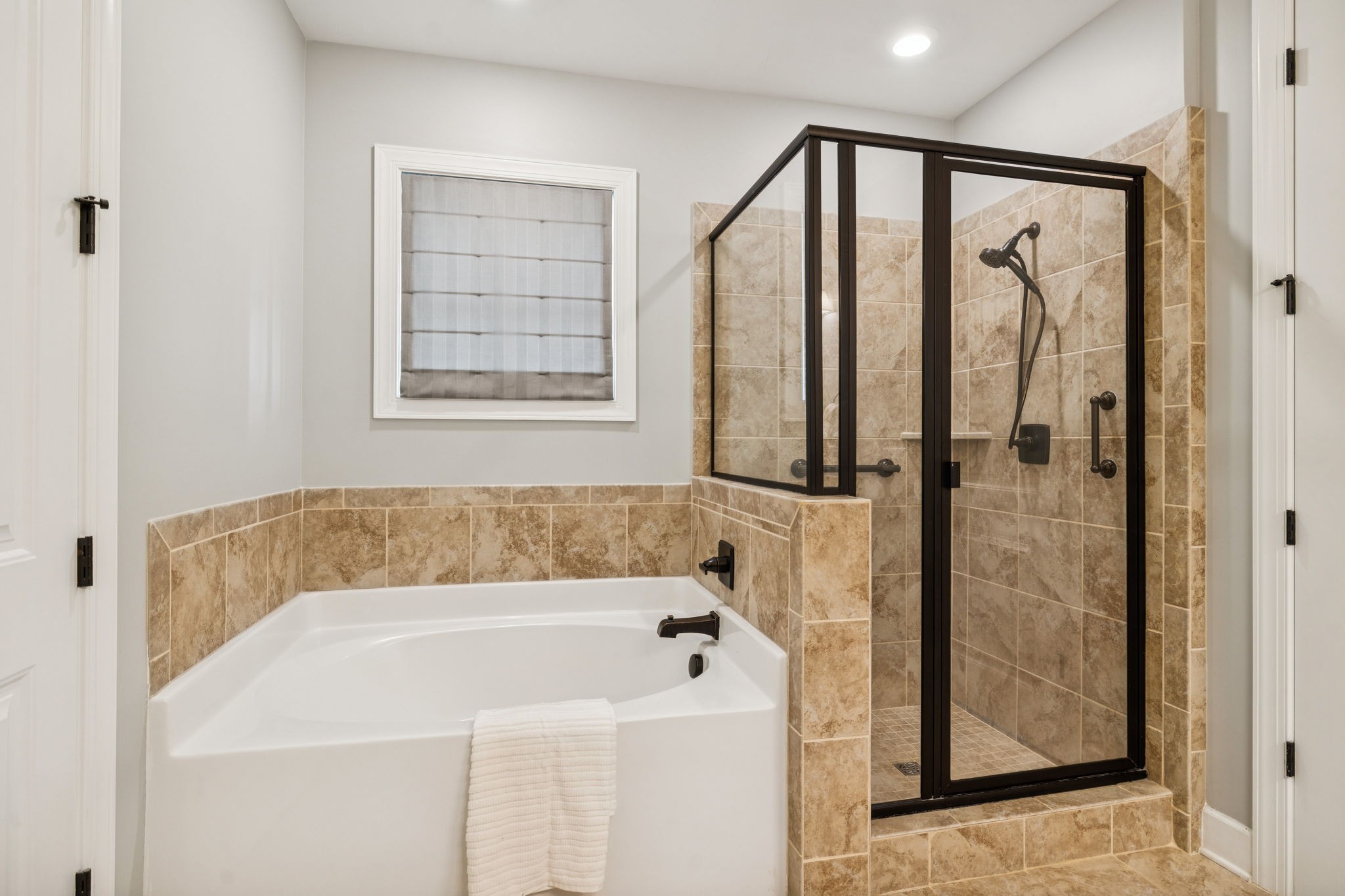 6000 Keats Street, Unit 202 Franklin, TN 37064 - Photo 37 of 47 a bathroom with a bathtub and a shower