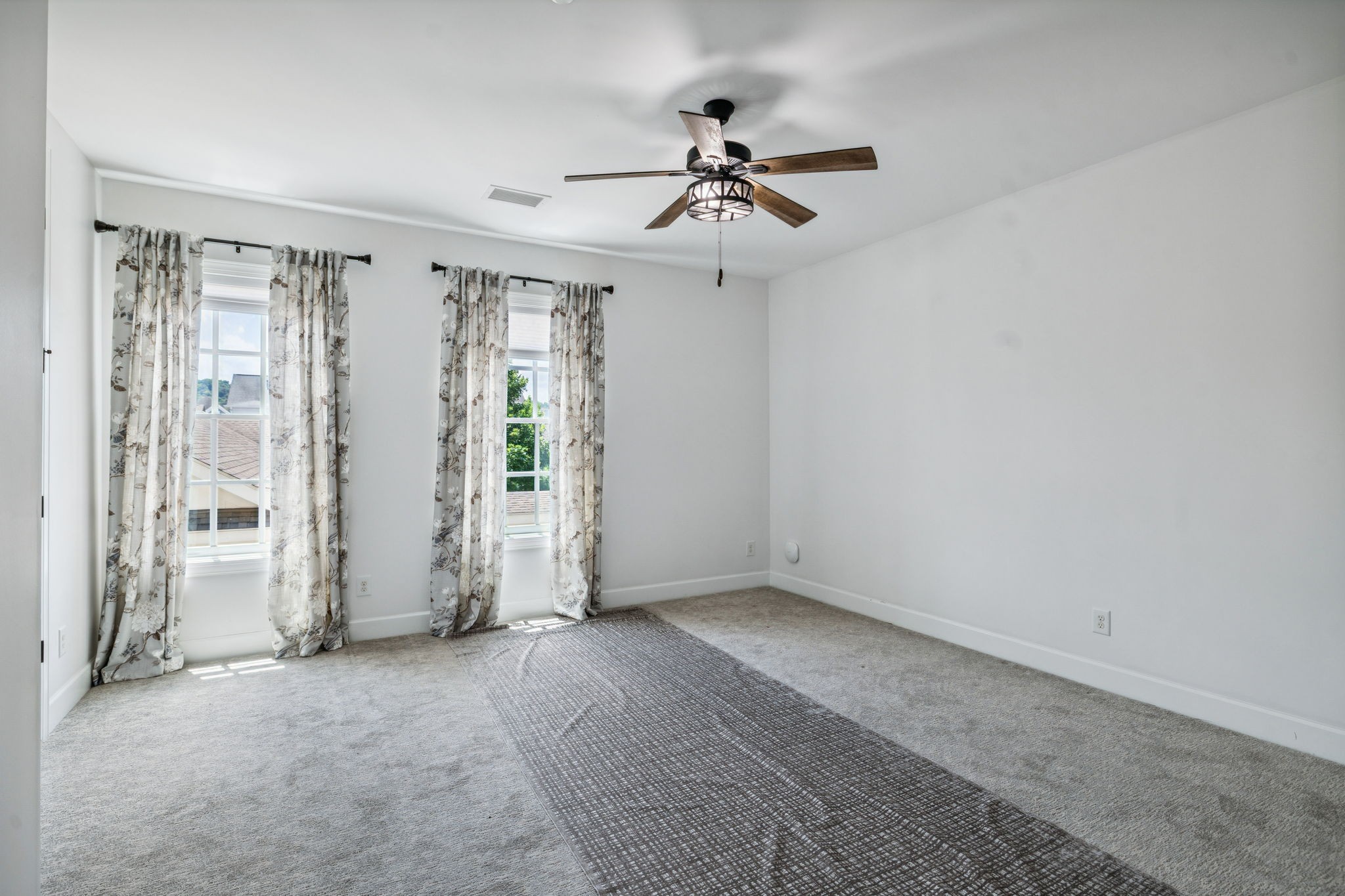 6000 Keats Street, Unit 202 Franklin, TN 37064 - Photo 40 of 47 a view of an empty room with a window