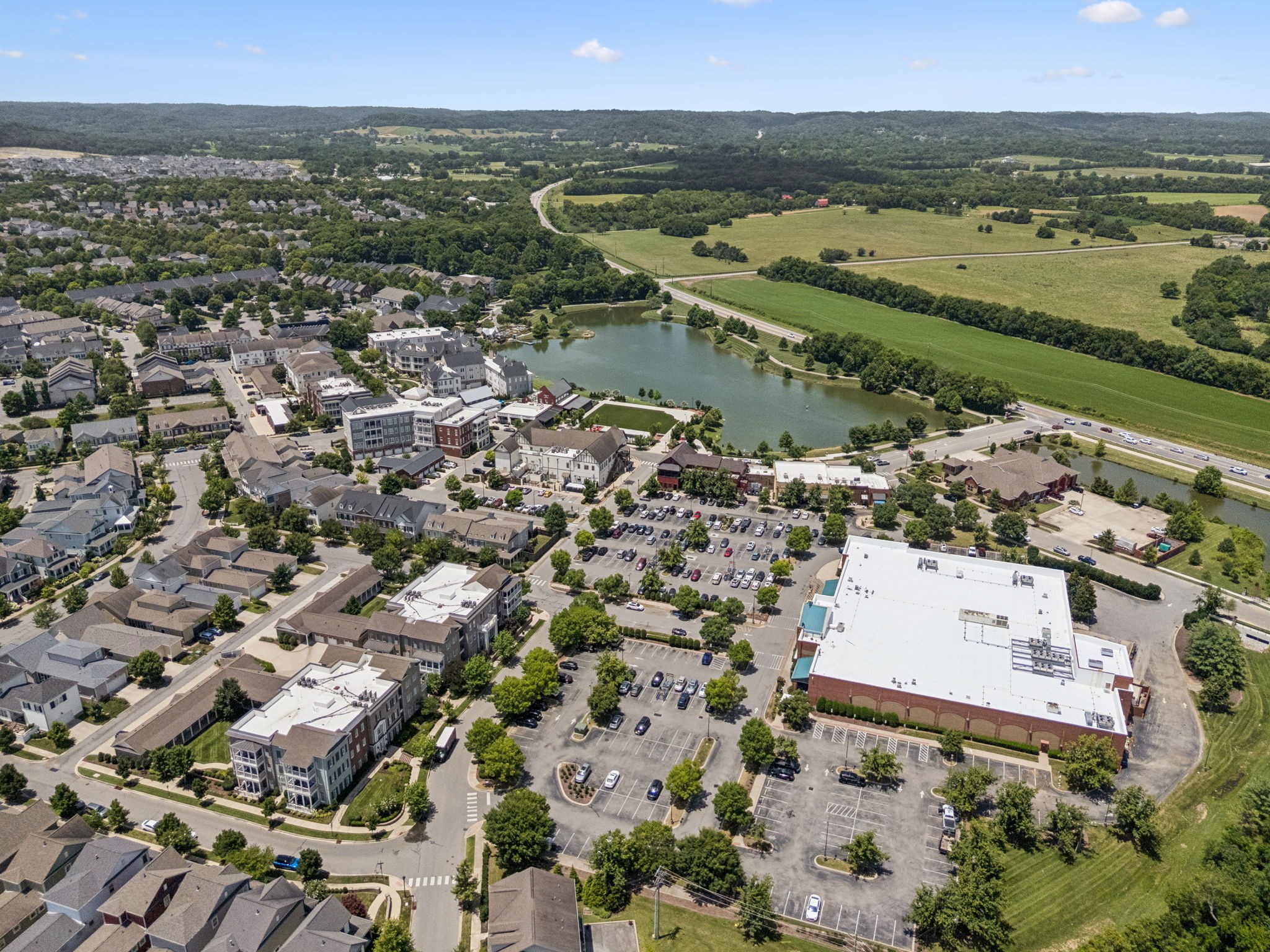 6000 Keats Street, Unit 202 Franklin, TN 37064 - Photo 45 of 47 an aerial view of residential building and lake