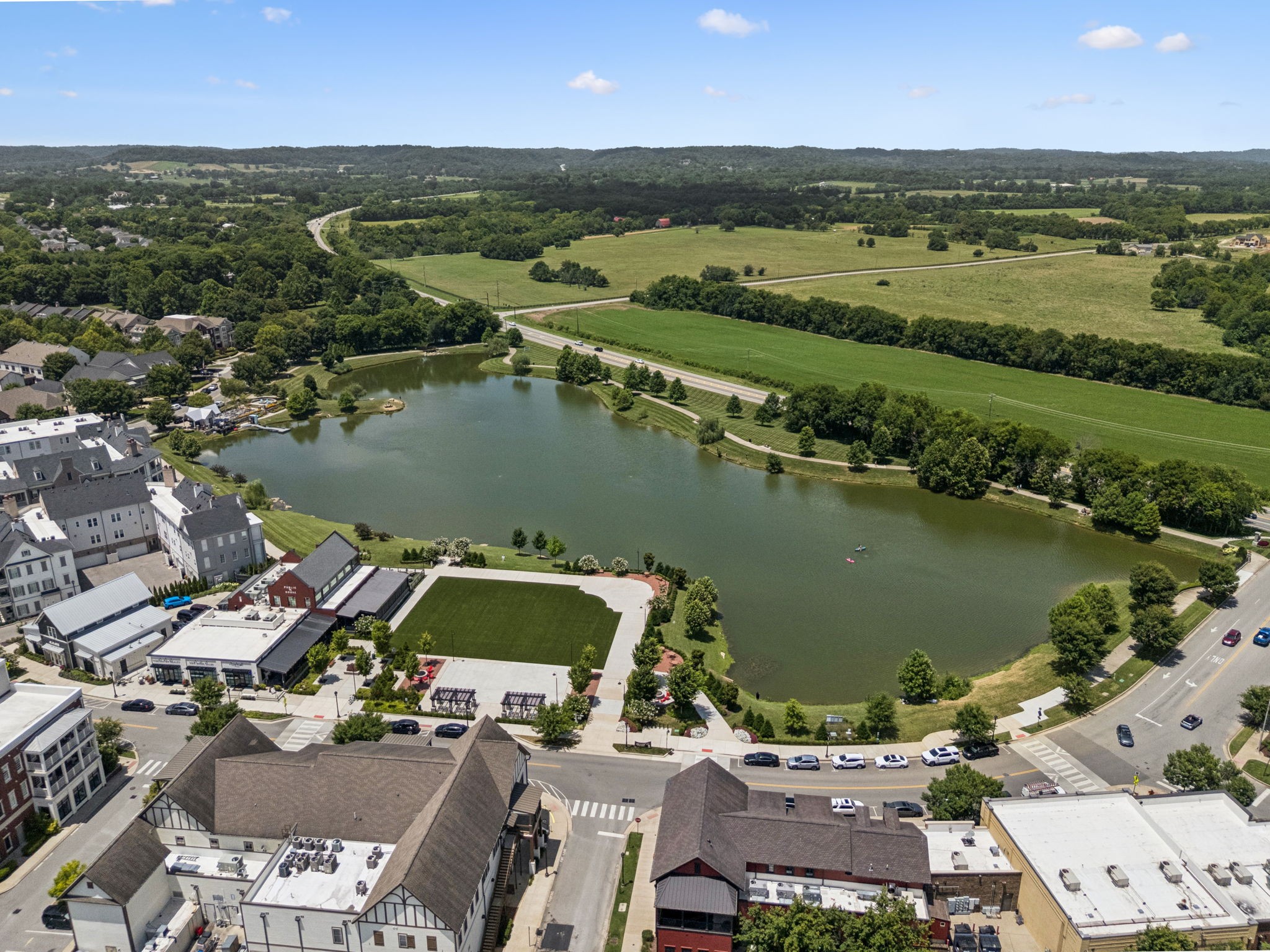 6000 Keats Street, Unit 202 Franklin, TN 37064 - Photo 46 of 47 an aerial view of residential houses with outdoor space and river
