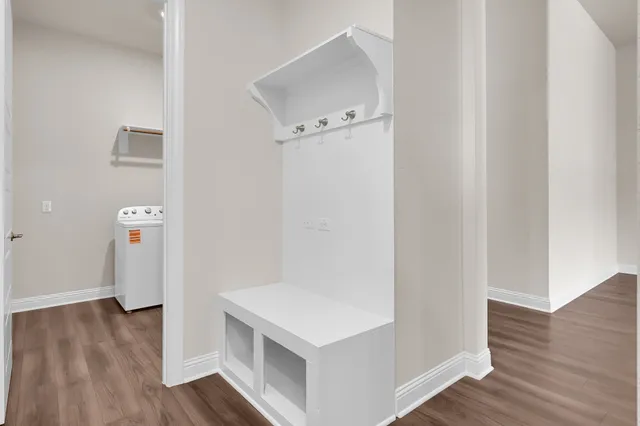 a view of bathroom with wooden floor