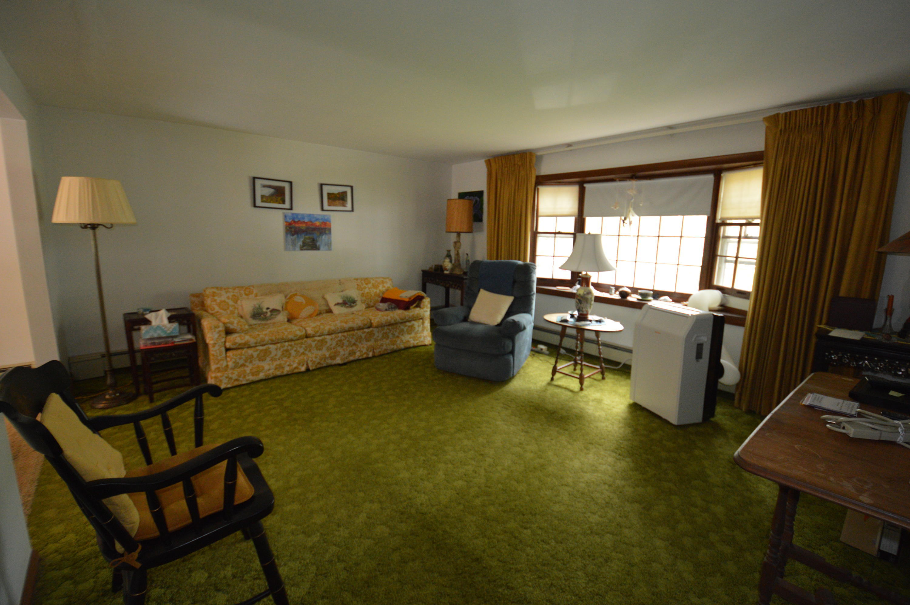 70 Geraldine Road Cotuit, MA 02635 - Photo 3 of 10 a living room with furniture and a flat screen tv