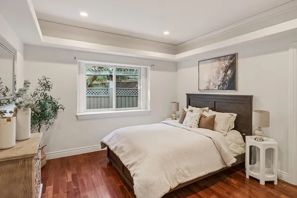 a view of a dining room with furniture and window