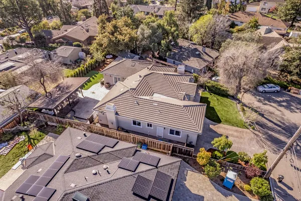 a kitchen with a refrigerator and a sink