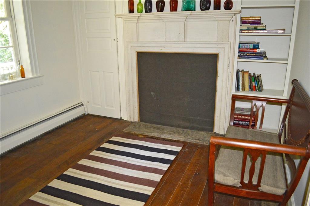 196 Buckingham Road Scenery Hill, PA 15360 - Photo 7 of 25 Den/Study with Built-In Shelving, Deco Fireplace and Hardwood Floors!