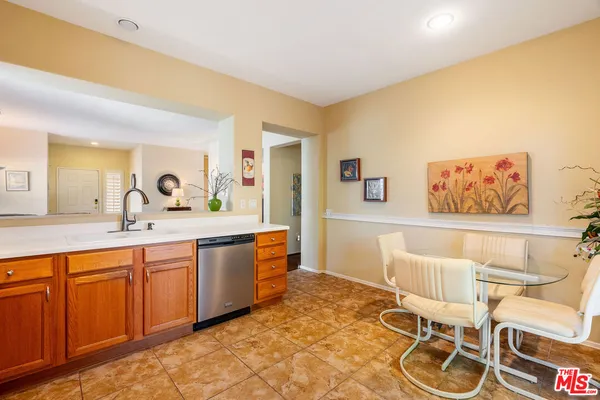 a large bathroom with a sink and a mirror