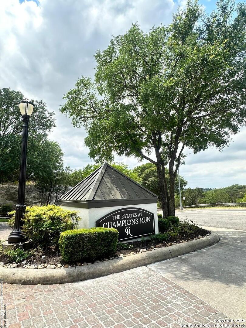 5 Trophy Ridge San Antonio, TX 78258 - Photo 3 of 4 a front view of a house with a yard