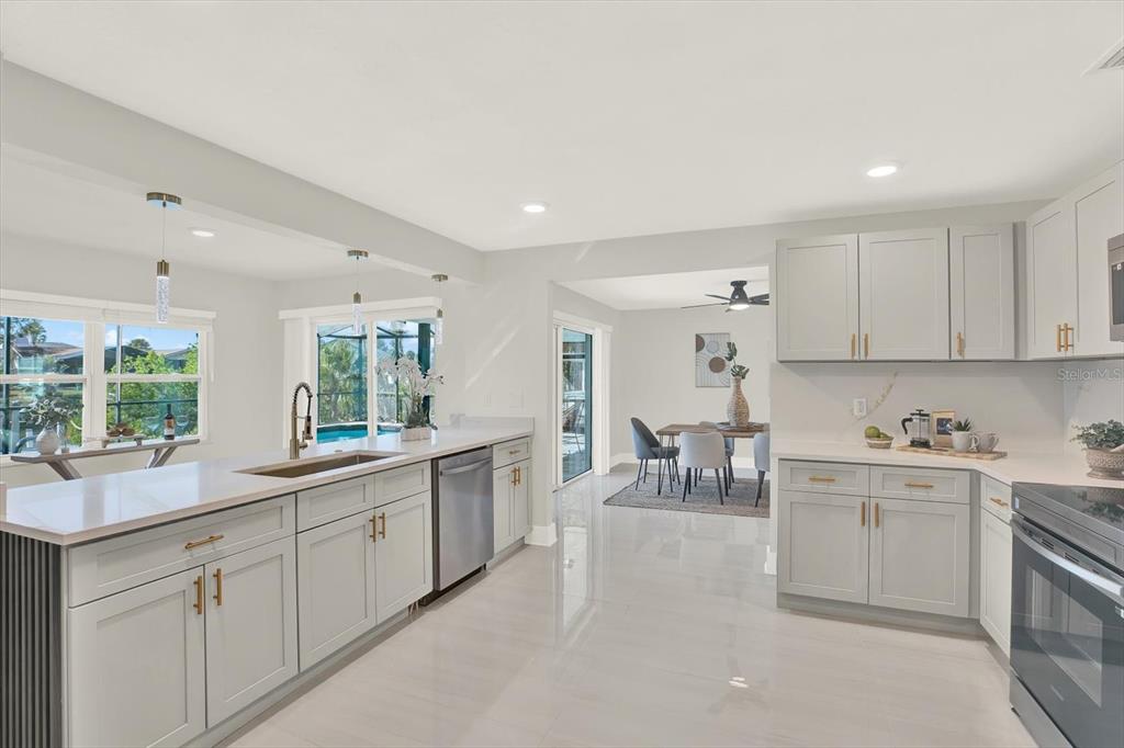 4346 Marine Parkway New Port Richey, FL 34652 - Photo 20 of 61 a kitchen with sink and cabinets