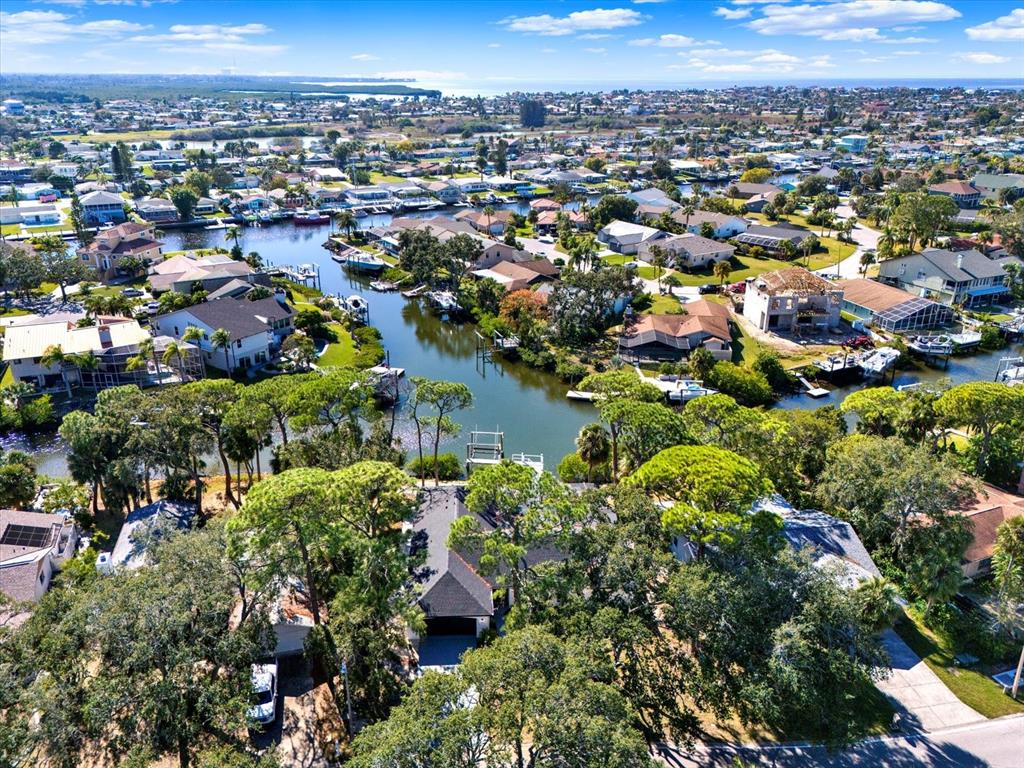 4346 Marine Parkway New Port Richey, FL 34652 - Photo 3 of 61 an aerial view of a city with lots of residential buildings