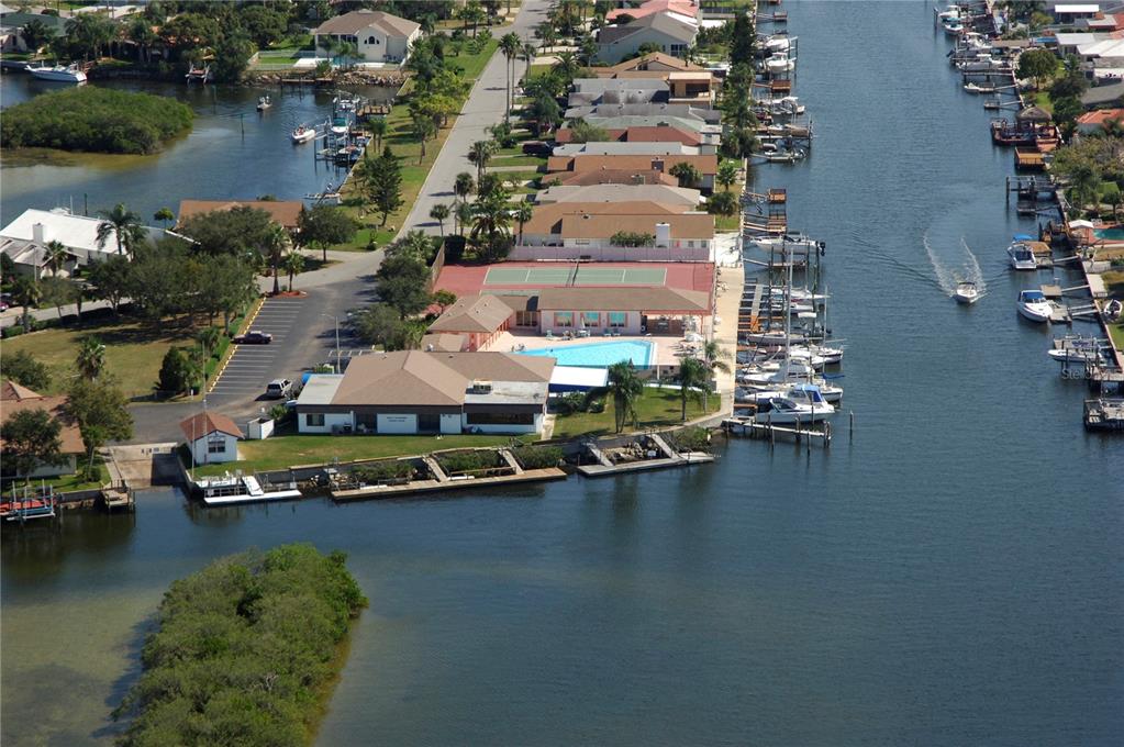 4346 Marine Parkway New Port Richey, FL 34652 - Photo 54 of 61 an aerial view of a house with a lake view