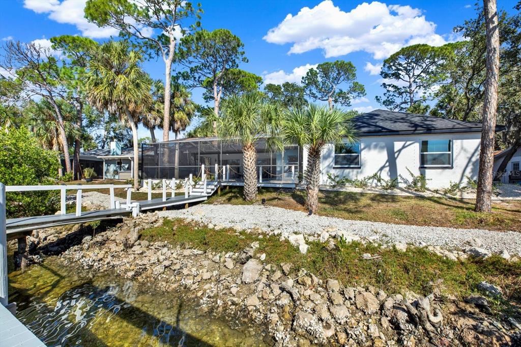 4346 Marine Parkway New Port Richey, FL 34652 - Photo 8 of 61 a view of a yard with swimming pool