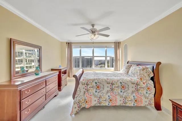 a bed room with a bed and a window